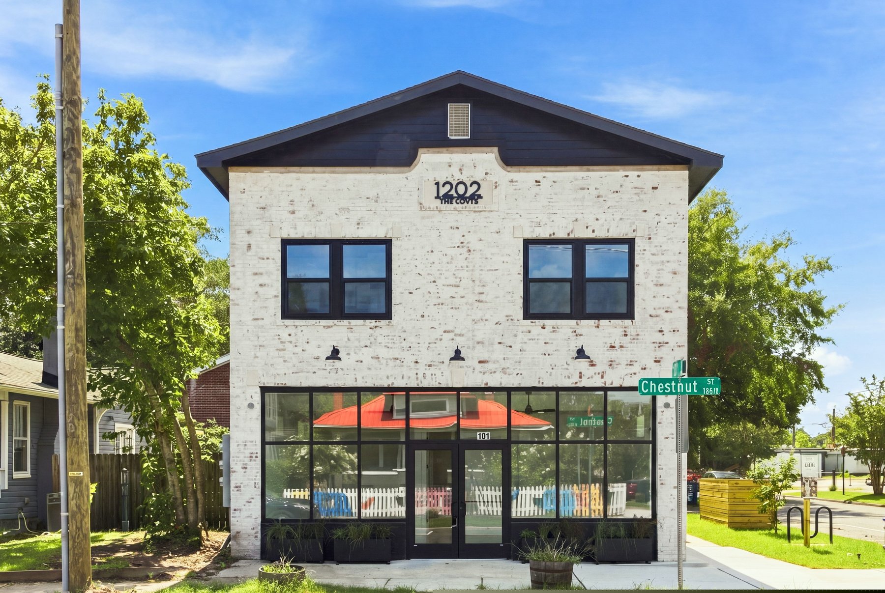 The restored brick facade of 1202 Chestnut Street in daylight